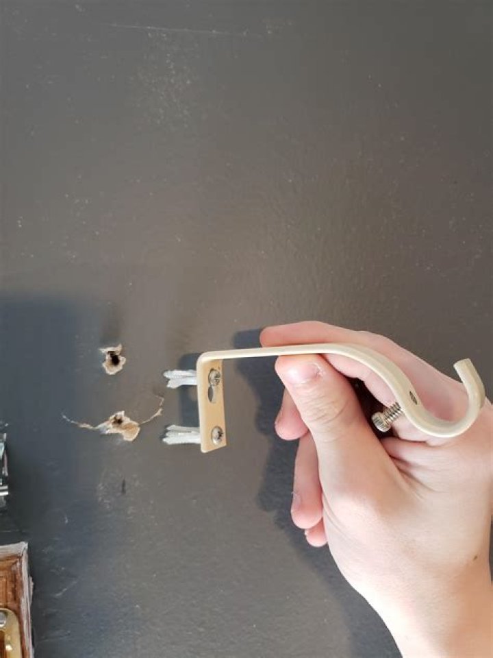 Question: How To Repair Curtain Rod Holes